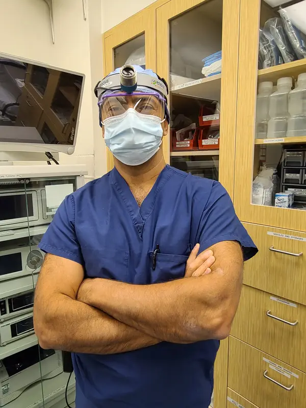 Dr. Faramarz Shabdiz, MD in surgical attire
